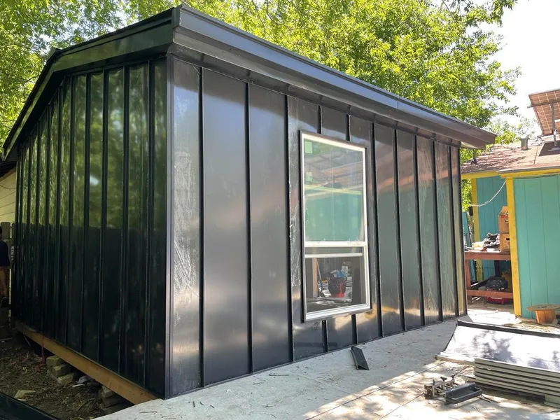 Black standing seam metal wall panels for Metal Roof Installation in Hopkinton